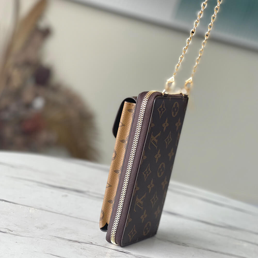 L0vis Vvtt0n Vertical Zippy Wallet Métis