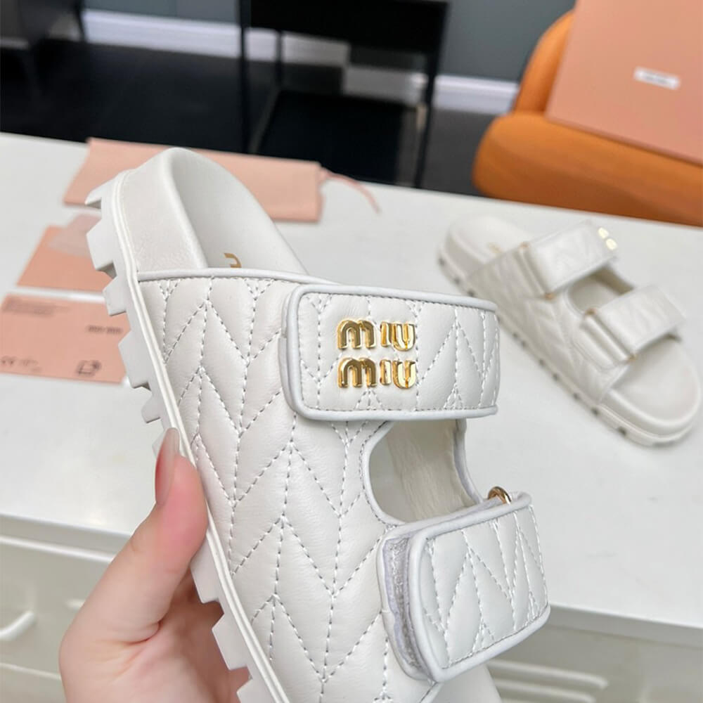 M1um1u Matelass?? nappa leather slides