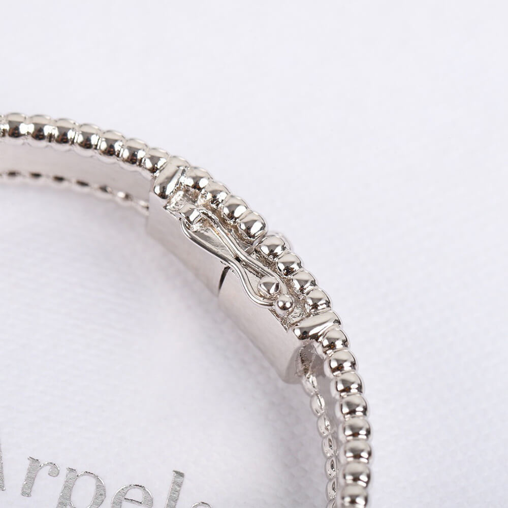 V*n Cl**f & Arpels Perlée Signature Bracelet, medium model