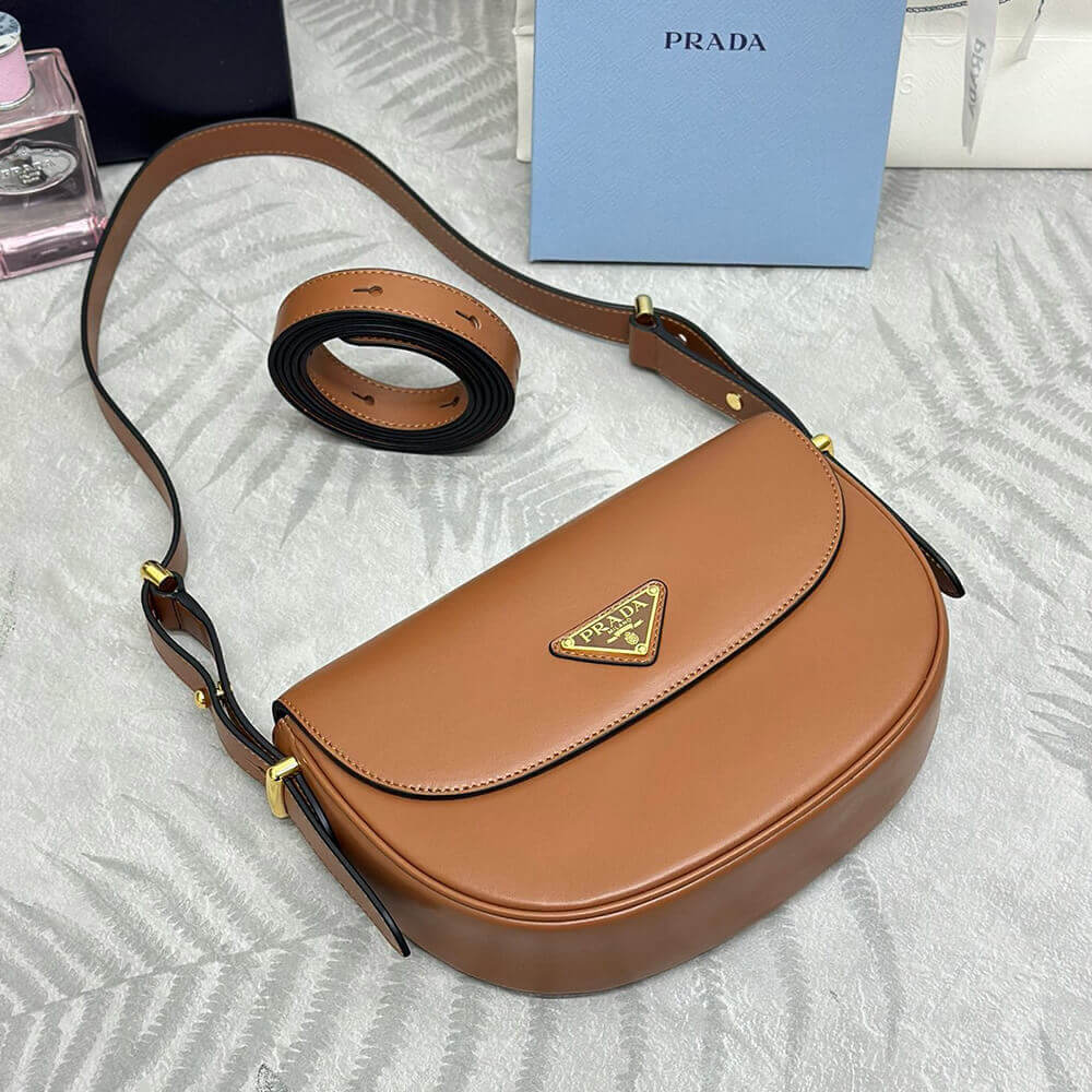 Pra*a Arque leather shoulder bag with flap