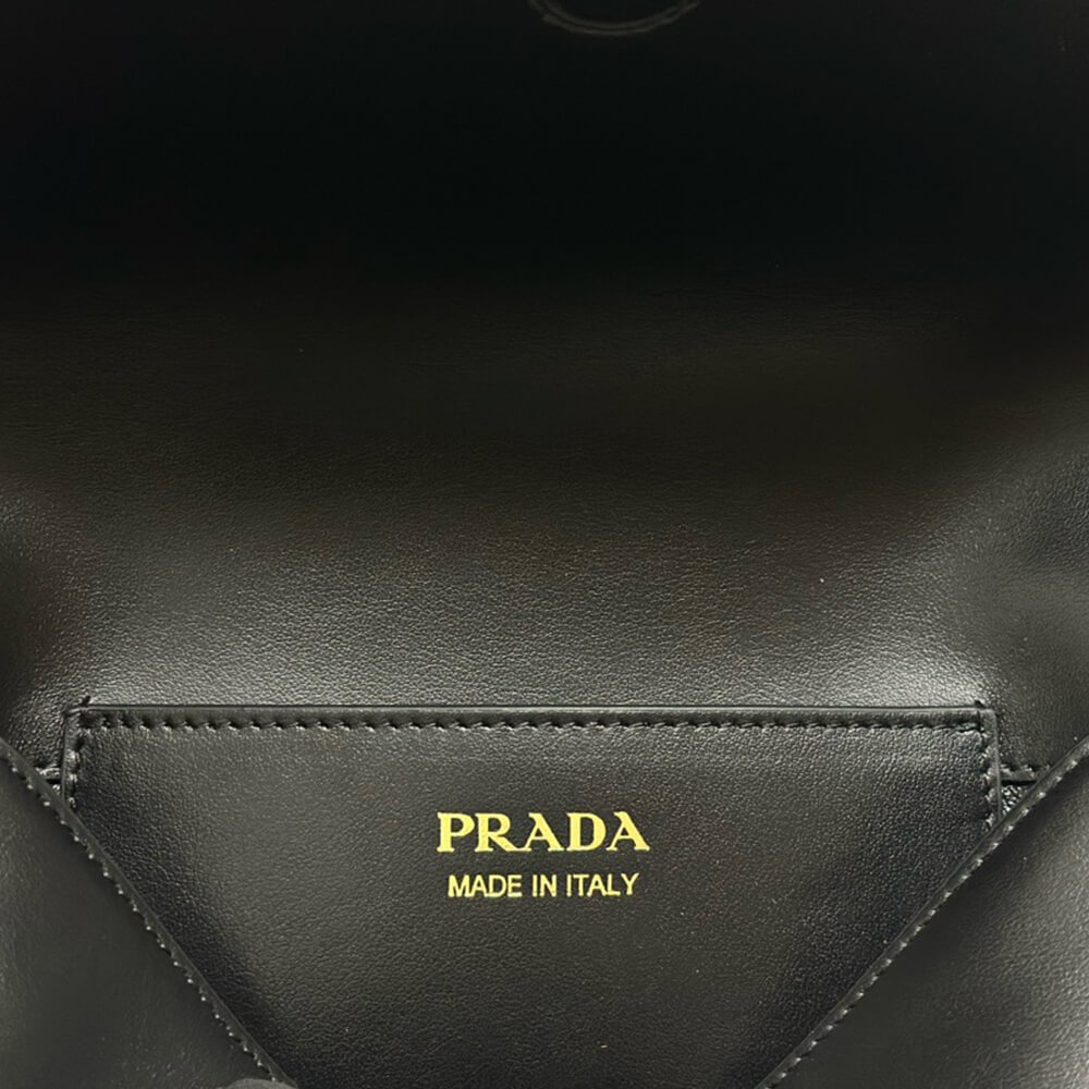 Pra*a Arque leather shoulder bag with flap