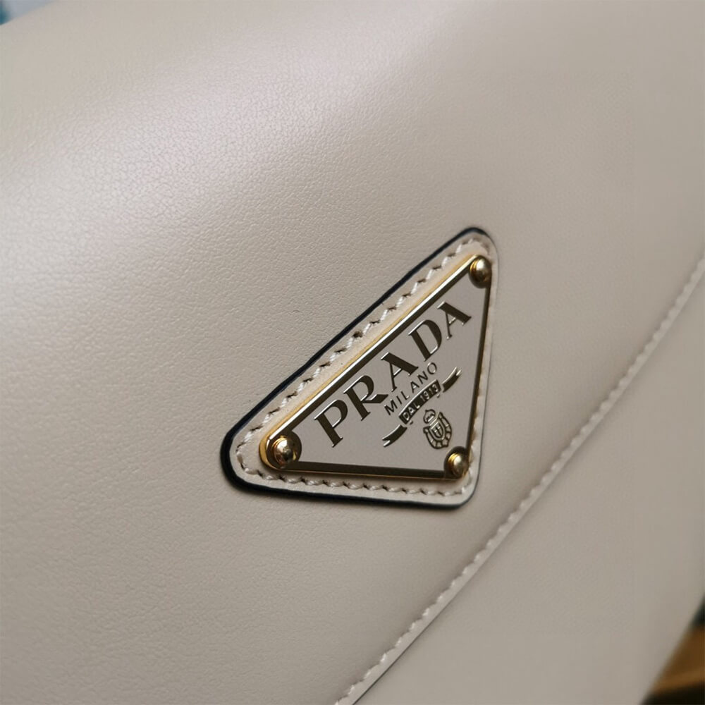 Pra*a Arque leather shoulder bag with flap