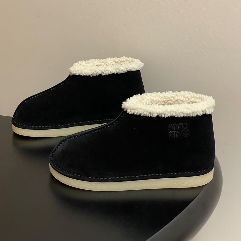 M1um1u Suede and shearling slip-on booties